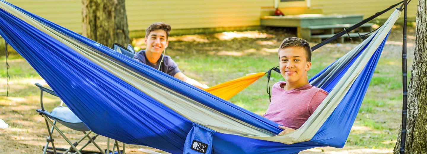 Boy campers in hammocks