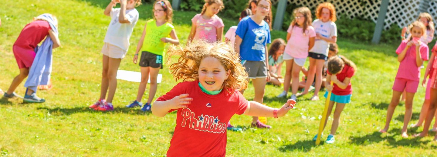 Campers running outside